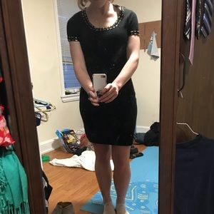 Small black body con sweater dress